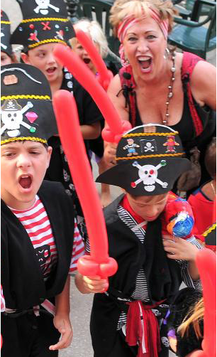 a group of children dressed in pirate costumes