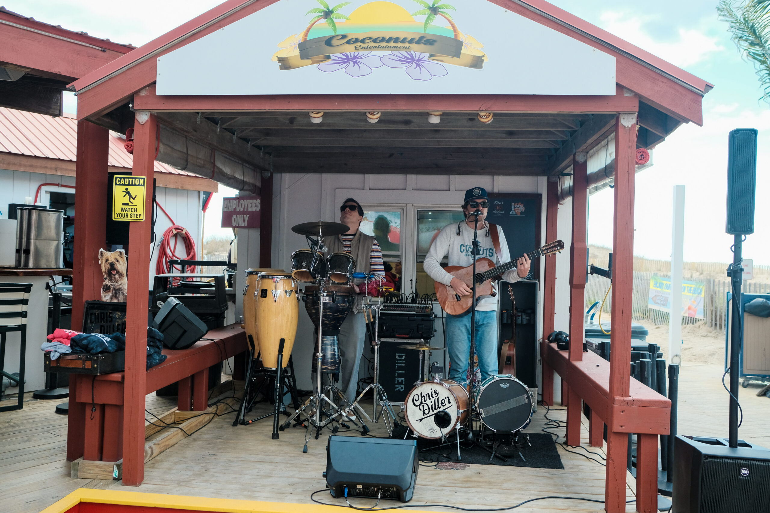 a group of people playing instruments on a stage