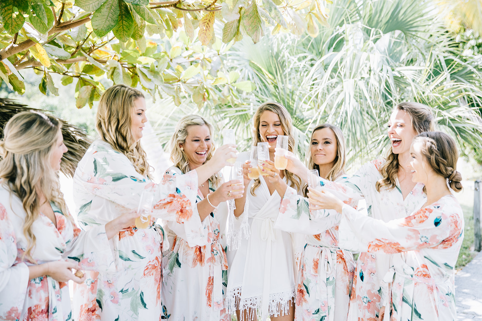 a group of women standing next to each other