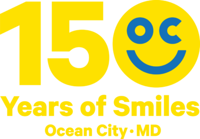 a yellow and blue sign that says 150 years of smiles