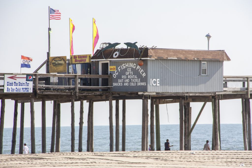 a pier with a building on top of it